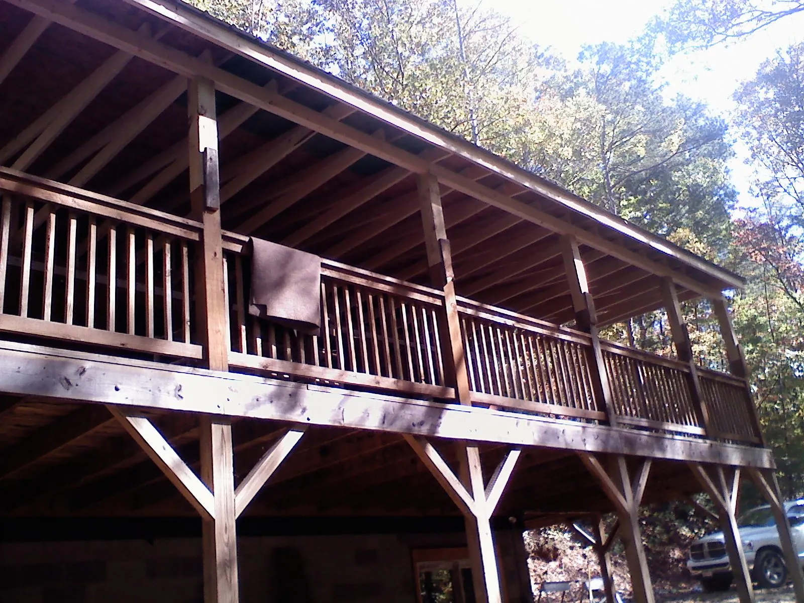 Timber framing under a new elevated porch and deck — Roof Leak Repair in Kingsford Heights by Roofing Brothers